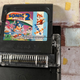 An Analogue Pocket with the Game Gear adapter and a copy of Sonic 2 inserted.
